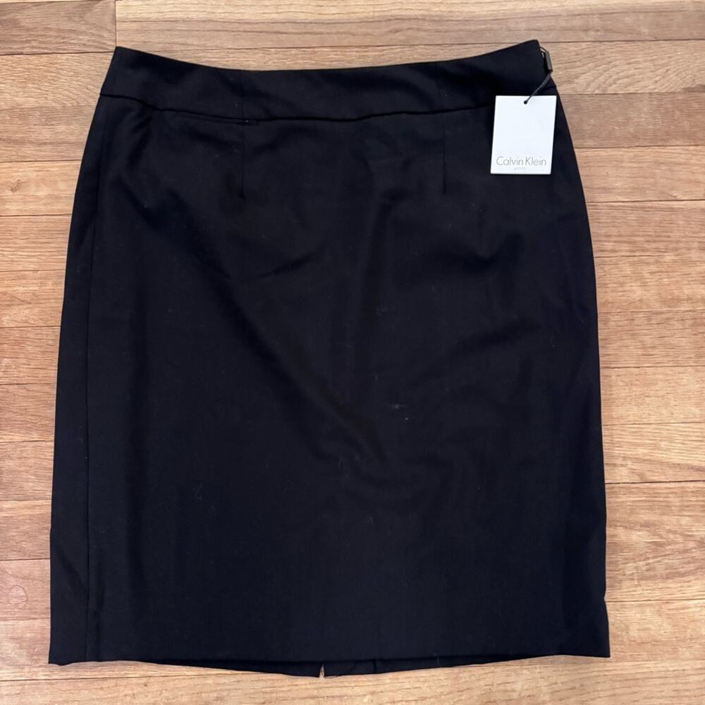NWT  Calvin Klein black knee length pencil skirt size 14
 b50